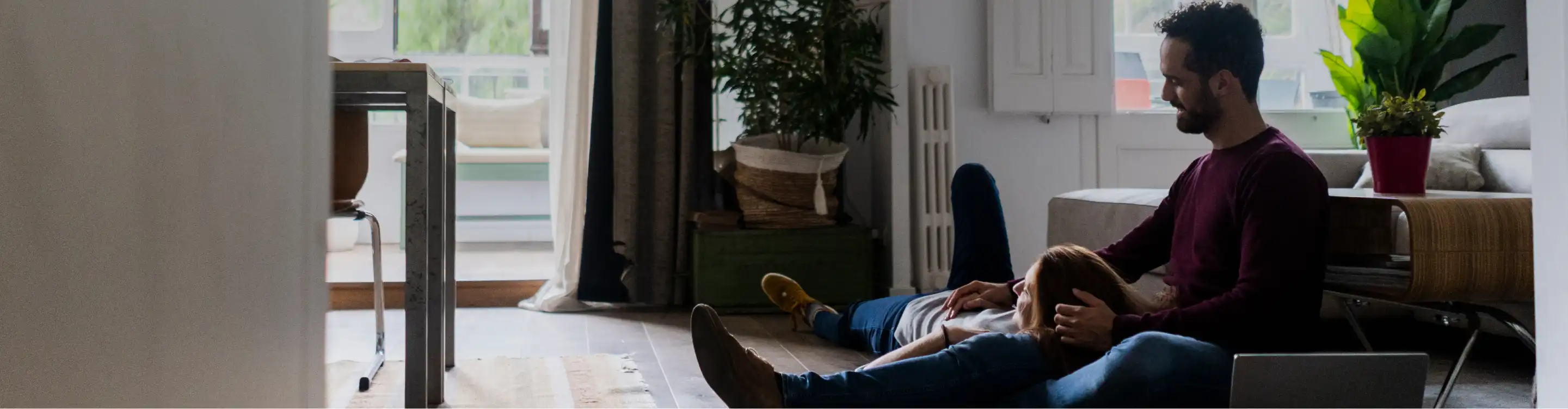 Couple sitting on floors 